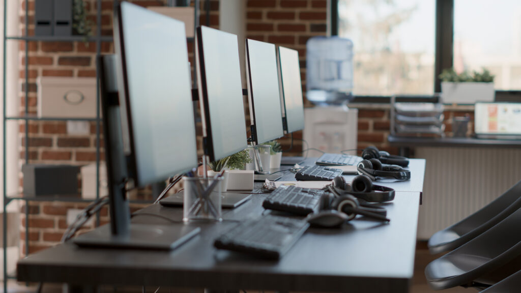 empty call center workstation with computers